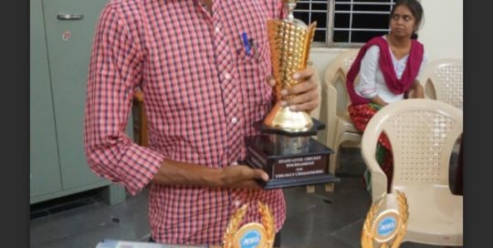 Captain of the team G. Suryanarayana with All India Trophy