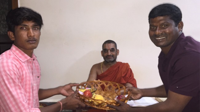 1st ranker of CPT exam, R. Bhanu Teja Rao comes along with Sriman Guvvala Bala Raju to seek blessings from HH