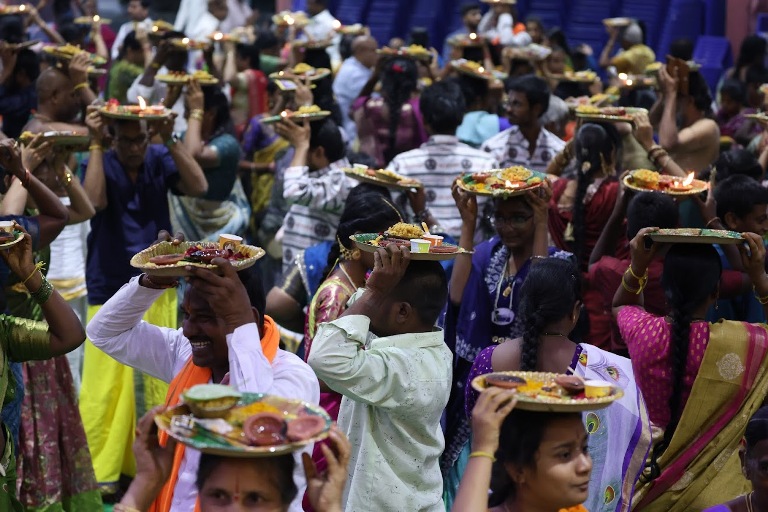 Devotees hold Sri Rama Padukas in Maha Samrajya Pattabhishekam at Statue of Equality