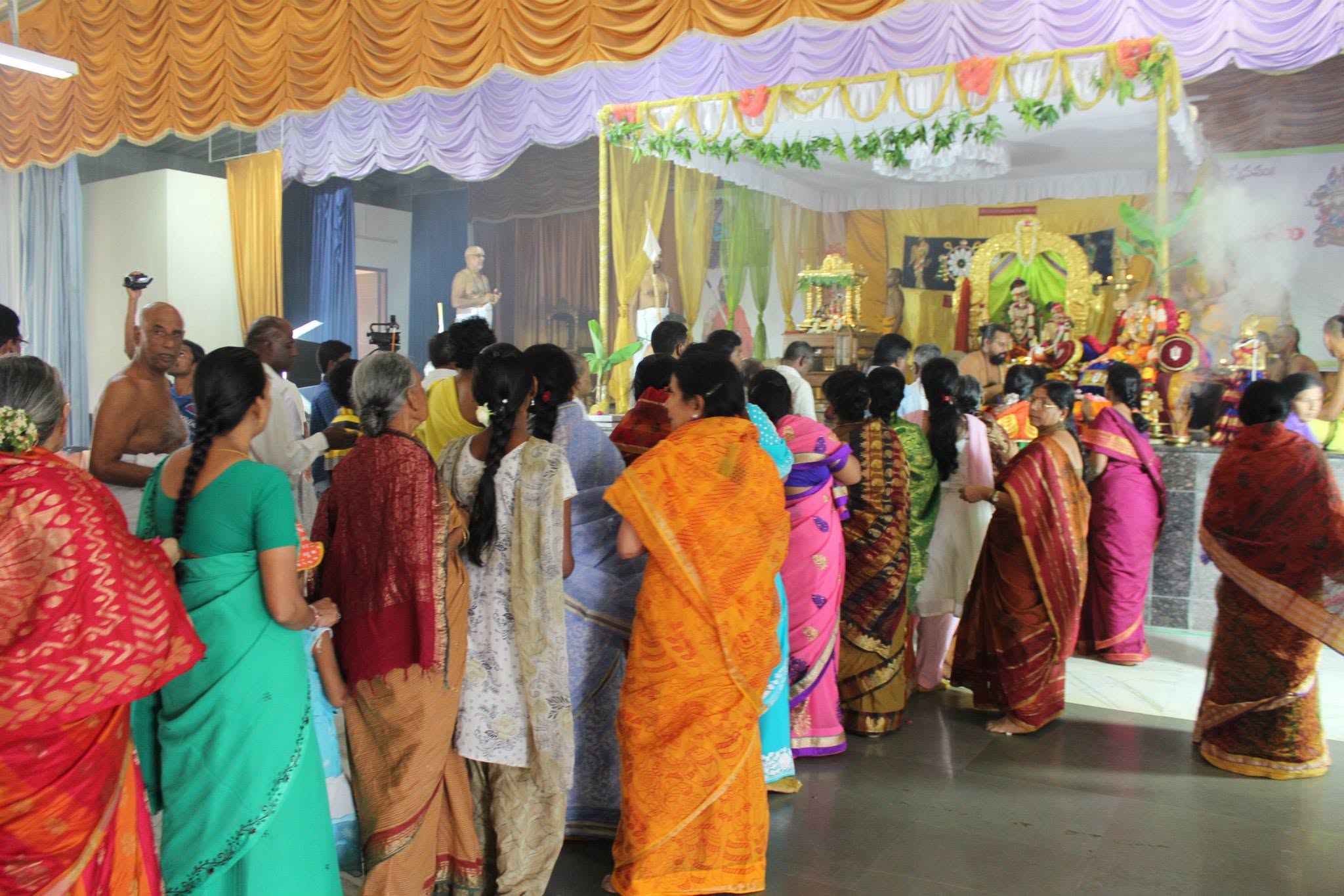Devotees offering flowers to HH Pedda Jeeyar Swamiji